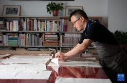 文化中国行·守宝人｜走近百年图书馆里的古籍守护者文化中国行·守宝人｜走近百年图书馆里的古籍守护者